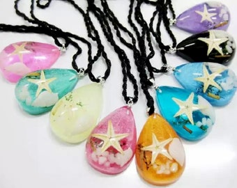 Starfish, Coral, Natural shells encapsulated in resin Handmade with lots of energy from the Pacific Ocean