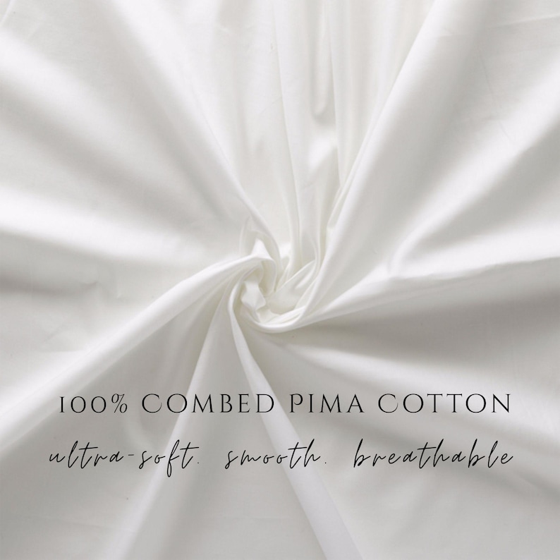 May include: A close-up of white fabric with soft folds. The text on the image reads "100% Combed Pima Cotton, ultra-soft, smooth, breathable."