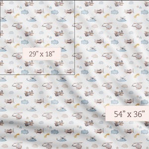 May include: White fabric with a repeating pattern of watercolor airplanes, helicopters, clouds, stars, and shooting stars. The fabric is available in 9" x 9", 29" x 18", and 54" x 36" sizes.