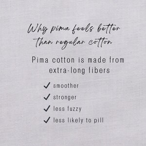 May include: A light gray background with handwritten text explaining the benefits of Pima cotton. The text reads "Why pima feels better than regular cotton." Additional text lists the benefits: smoother, stronger, less fuzzy, and less likely to pill.