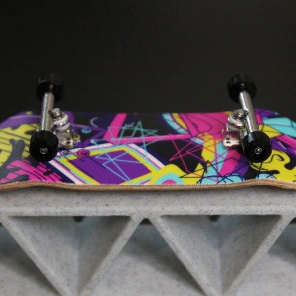 The "Graffiti" Fingerboard Eco Series Complete Setup - Includes Deck, Trucks, Wheels, Tape, Hardware, and Tool