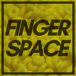 May include: A yellow background with the text "FINGER SPACE" in black bold letters.