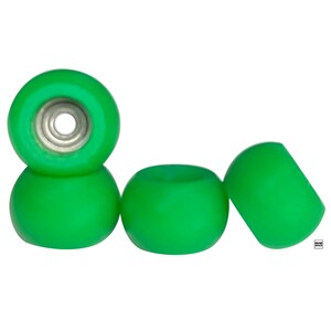 May include: Four bright green fingerboard wheels. The wheels are made of a smooth, hard plastic and have a slightly rounded shape.