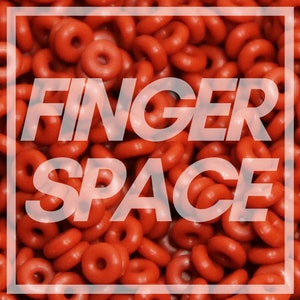 May include: A close-up image of a large pile of red rubber rings. The text "FINGER SPACE" is superimposed on the image.