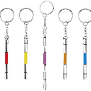 May include: Five keychain screwdrivers with different coloured handles: red, yellow, purple, orange, and blue. Each screwdriver has a keyring attached.
