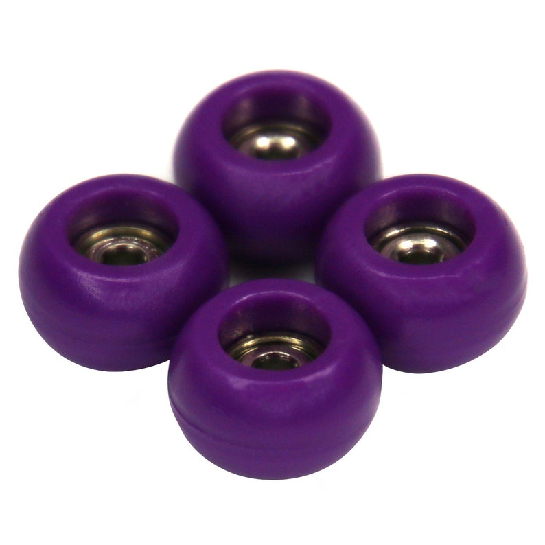 May include: Four purple fingerboard wheels with silver bearings.