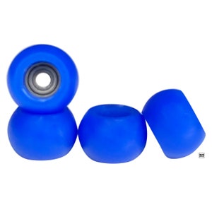 May include: Four blue fingerboard wheels with black bearings. The wheels are arranged in a row, with the front wheel slightly offset from the others.