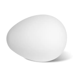 May include: A smooth, white, egg-shaped object with a rounded top and a slightly pointed base. The object casts a soft shadow on the white background, suggesting a light source from the upper right. The form is simple and minimalist.