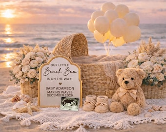 May include: A beach-themed pregnancy announcement scene. A woven bassinet, teddy bear, and baby booties sit on a blanket. A sign reads "OUR LITTLE Beach Bum IS ON THE WAY! BABY ADAMSON MAKING WAVES DECEMBER 2026". Balloons and floral arrangements complete the scene.