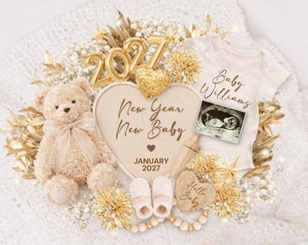 May include: A baby announcement with a teddy bear, a onesie with the name "Baby Williams", and a sonogram image. The announcement includes the text "New Year New Baby" and "January 2027". Gold accents and baby shoes complete the design.