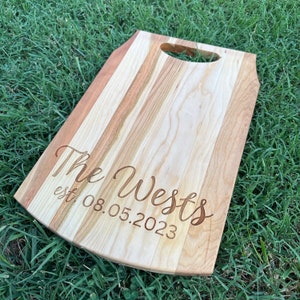 Personalized wood cutting board with handle and juice groove