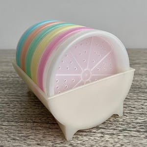 Juego de posavasos Tupperware vintage en tonos pastel: 6 colores en un estuche blanco.