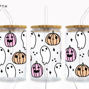 May include: Three clear glass tumblers with bamboo lids and straws. Each tumbler features a Halloween-themed design with pink, orange, and white ghosts and pumpkins.