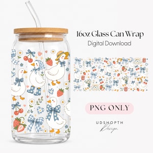 May include: A 16oz glass can with a bamboo lid and clear straw, featuring a repeating pattern of white ducks, blue gingham bows, red strawberries, cherries, and daisies. The text reads 16oz Glass Can Wrap, Digital Download, PNG ONLY, UDSHOPTH Design.
