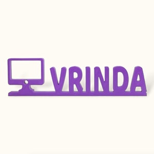 May include: Purple wooden sign with the word "VRINDA" and a computer monitor icon.