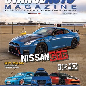 May include: A blue Nissan GTR Nismo sports car with a black carbon fiber hood and red accents. The car is parked on a sandy surface with a fence and a large ship in the background. The text "NISSAN GTR NISMO" is printed in large red letters on the image.