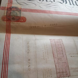 May include: Vintage document with elaborate calligraphy and red stripes. Includes a Birmingham stamp. Text includes: Warwick Road, School Road, Poplar Road, and Oakfield Villas. A historical map or deed.