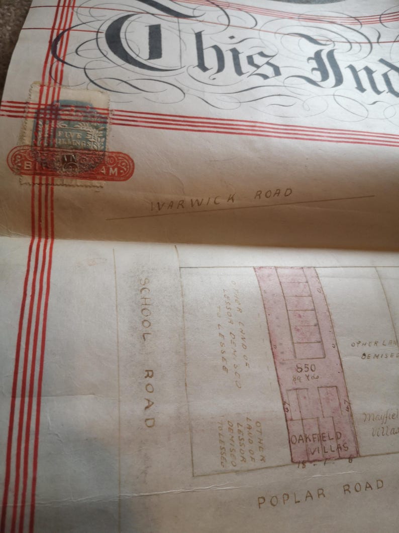 May include: Vintage document with elaborate calligraphy and red stripes. Includes a Birmingham stamp. Text includes: Warwick Road, School Road, Poplar Road, and Oakfield Villas. A historical map or deed.