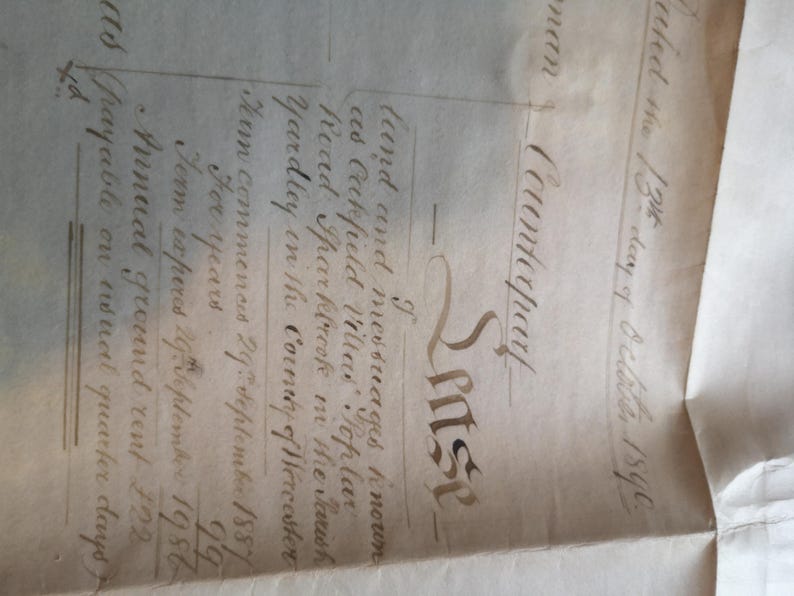 May include: An antique document with handwritten text, featuring the word "Counterpart" in ornate script. The aged paper shows faded ink and detailed script, with dates and legal terms visible. The document appears to be a legal or historical record.