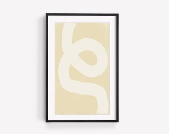 May include: Abstract art print in a black frame. The artwork features a cream-colored, looping line against a pale yellow background. The print is a minimalist design, suitable for modern home decor.