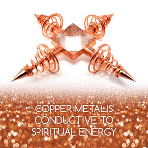 May include: A copper crystal grid with four copper spirals and a clear quartz crystal in the center. The copper metal is conductive to spiritual energy.