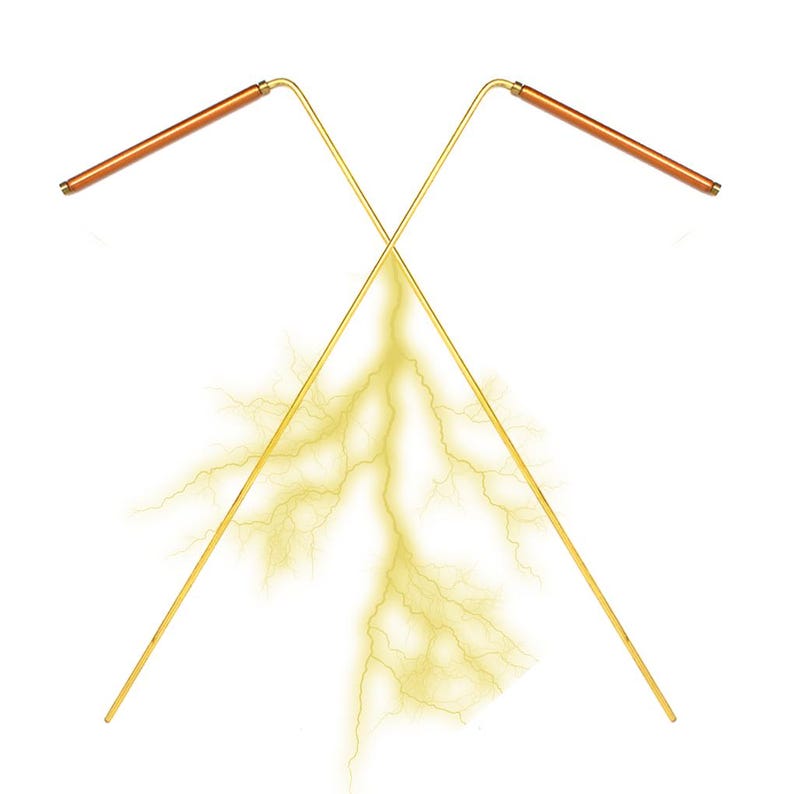 May include: Two gold-colored metal rods crossed at the center, with a yellow lightning bolt effect emanating from the point where they intersect.