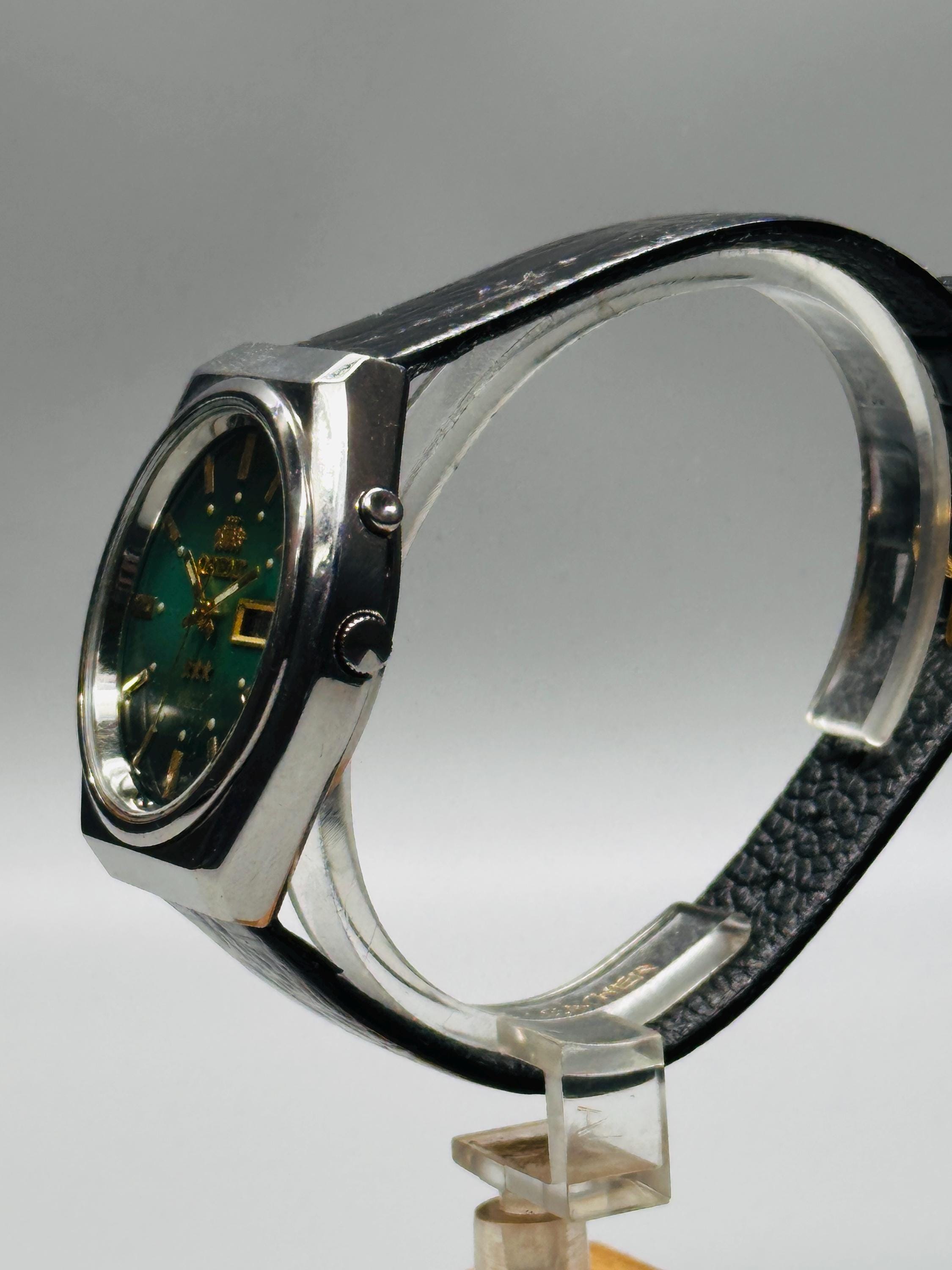 Vintage Orient Crystal Automatic Watch: 21 Jewels, Green Dial