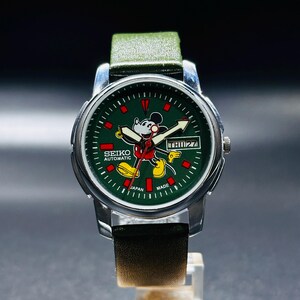 Orologio da polso da uomo Seiko 5 automatico vintage usato, quadrante verde, cassa argentata, giorno/data, calibro raro n. 6309, prodotto in Giappone.