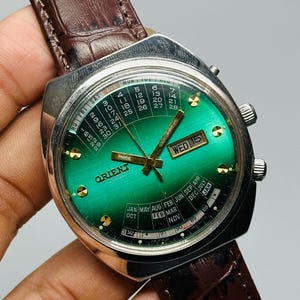 Rare Vintage  Orient College Perpetual Multi Year, Green Dial , Date & Day, Automatic, Japan Made,