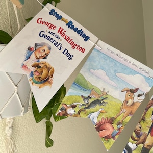 May include: A banner featuring illustrations from a children's book about George Washington and his dog. The banner includes the text "Stop into Reading" and "George Washington and the General's Dog". The illustrations depict George Washington and various animals.