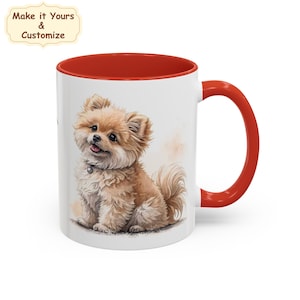 Pode incluir: Caneca de cerâmica branca com interior e alça vermelhos. A caneca apresenta uma ilustração em aquarela de um cão da raça Pomerânia marrom claro e fofo. O texto "Make it Yours & Customize" está no canto superior esquerdo.