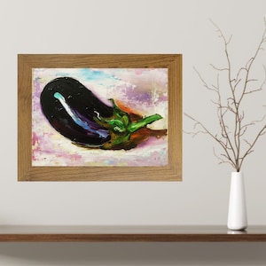 May include: Oil painting of an eggplant in a wooden frame. The eggplant is dark purple with a green stem and sits on a background of pink, white, and purple brushstrokes. The frame is a light brown color.