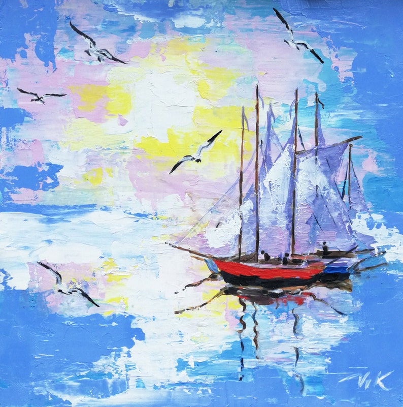 May include: A painting of a sailboat with white sails on a blue body of water. The sky is a mix of pink, yellow, and blue with white clouds. There are several seagulls flying in the sky.