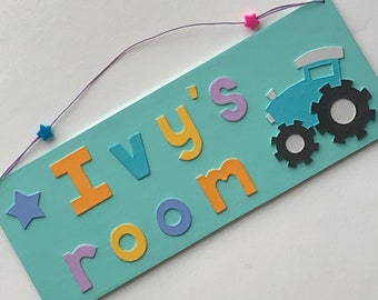 Any Name! Tractor themed personalised name plate with aqua background.