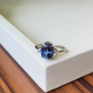 Dainty Tanzanite Ring: Oval Cut Sterling Silver Engagement Ring