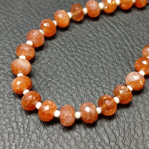 Faceted Sunstone Rondelle Beads: Orange Crystal Gemstone, 6-10mm, 6 Inch Strand