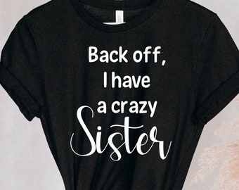 Camisas Sarcastic divertidas para la hermana - Atrás tengo una camiseta hermana loca - Regalo de cumpleaños de la hermana - Regalo para la hermana -Ropa de mujer