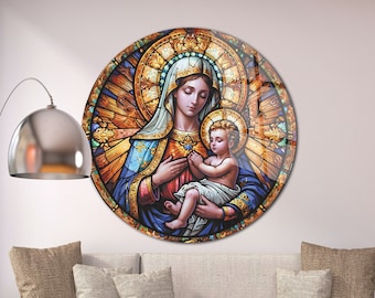 May include: A stained glass style round wall art featuring a depiction of the Virgin Mary holding baby Jesus. The artwork is framed in a circular metal frame and has a colorful design with shades of blue, red, yellow, and gold.