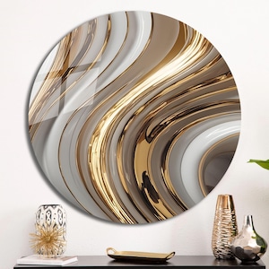 May include: Abstract wall art featuring a circular design with swirling, overlapping lines in shades of white and gold.
