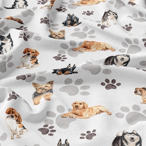 May include: White fabric with a repeating pattern of various dog breeds and paw prints. The dogs are illustrated in a watercolor style and include breeds such as a Beagle, Bulldog, Yorkshire Terrier, and Husky.