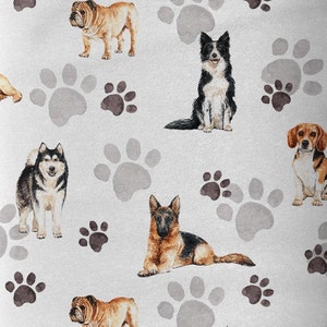 May include: A seamless pattern featuring various dog breeds, including a bulldog, a German Shepherd, a Border Collie, a Husky, and a Beagle. The background is a light gray with paw prints in shades of gray and brown.