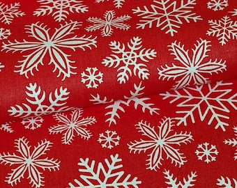 Weihnachtliche Schneeflocken auf rotem 100% Baumwollstoff, breite Rolle 160cm breit