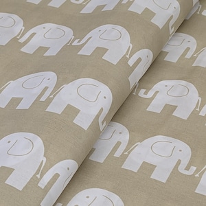 Elephants white on beige 100% cotton fabric  , wide roll 160cm wide