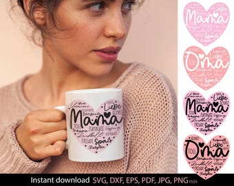 May include: A white ceramic mug featuring a pink heart design with the word "Mama" in the center, surrounded by German words. The mug is held by a person wearing a pink sweater. Additional pink heart designs are visible.
