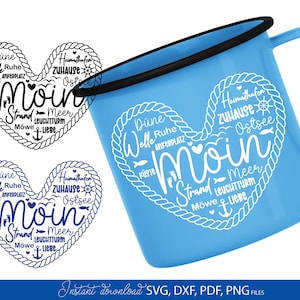 May include: A light blue enamel mug with a black rim, featuring a white heart-shaped design with nautical-themed words. The design includes the word "Moin" and other German words. The image also shows two heart-shaped designs.
