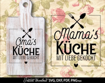 May include: A white wooden cutting board with a handle, featuring the text "Oma's Küche" and "Mit Liebe Gekocht" in black, along with a crossed fork and spoon design. A heart is below the text. The background is a floral pattern.