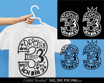 Op de afbeelding: Een zwart-wit ontwerp met het nummer drie met het woord "drei" (Duits voor drie) eromheen herhaald. Het ontwerp bevat ook de woorden "Ich bin 3" (Duits voor "Ik ben 3").