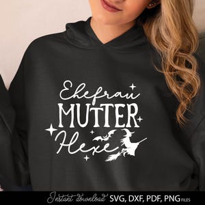 May include: Black hoodie with white text that reads "Ehefrau, Mutter, Hexe" with stars, bats, and a witch on a broom. The bottom of the image has the words "Instant download" and "SVG, DXF, PDF, PNG FILES".