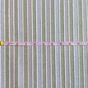 Policotone 240g a righe con treccine beige: tessuto resistente, ideale per creare progetti di tappezzeria e arredamento personalizzato.