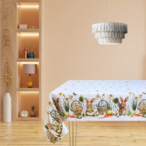 May include: A trio of ceramic mugs with a speckled, matte finish in cream, light grey, and dark grey. Each mug features a simple, minimalist design, ideal for tea or coffee.